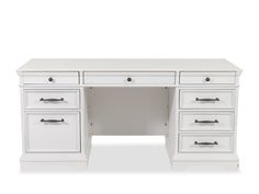 a white desk with two drawers and one drawer on the top, in front of a white background