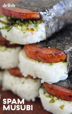 several sushi rolls stacked on top of each other