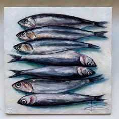 a painting of five fish on a white background