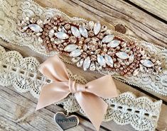 "Rose Gold Wedding Garter, No Slip Lace Wedding Garter Set, Vintage Rhinestones and Opals, Bridal Garter Set All of my garters are hand tailored to fit you and reinforced with non slip grip. Customize your bow color, see details below and colors in the photo carousel. Receive 10% coupon here---> (copy and paste this URL into your browser) https://bit.ly/2WFsFNR ------CUSTOMIZE YOUR ORDER----- Please leave COLOR SELECTIONS and NEEDED ARRIVAL DATE in the \"note to seller\" box at checkout. To s Gold Garter, Lace Wedding Garter Set, Wedding Garter Blue, Bridal Garter Lace, Lace Garter Set, Wedding Garter Lace, Bridal Garters Set, Wedding Garter Set, Wedding Garters