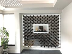 a wine rack in the middle of a room