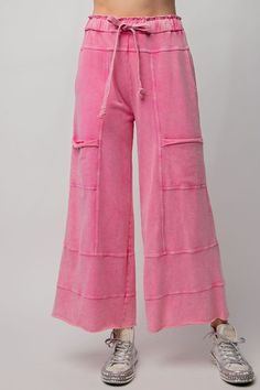 These may be the best lounge pants we've ever seen. Mineral washed Terry knit pants featuring cargo style pockets, wide legs, elastic ached waist and adjustable drawstring. Features exposed seaming. Relaxed and loose fit. Washed pink in color Model is 5'10 wearing a size small -Small measurements : length - 37' & waist -14' 100% Cotton Knit Wide Leg Pants, French Terry Pants, Cotton Cargo Pants, Solid Color Pants, Cargo Style, Knee Dress, Mid Dresses, Wide Legs, Knit Pants