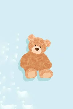 a brown teddy bear sitting up against a blue background