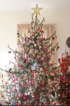 a decorated christmas tree in a living room