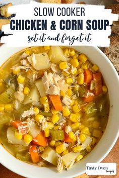 slow cooker chicken and corn soup in a white bowl with bread on the side