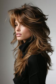 This long-layered shaggy mullet hairstyle for women is enhanced with caramel brown highlights. The warm highlights add dimension to the cut, creating a dynamic and vibrant look that’s perfect for adding a touch of brightness to your style. Layered Shag, Shaggy Long Hair, Long Shag Haircut, Arabian Stallions, Shag Haircuts, Hairstyles For Layered Hair, Everyday Clothing