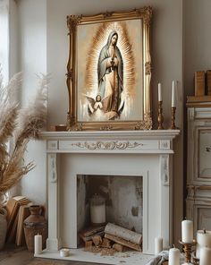 a painting on the wall above a fire place in a room with candles and other items