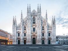 the front view of a large cathedral with many windows