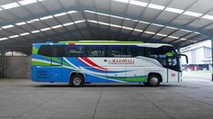 a bus is parked in a covered area