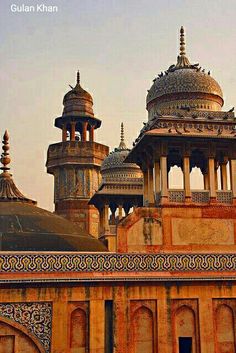 an old building with many domes and arches around it's perimeters in india