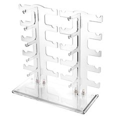 a clear plastic rack with multiple compartments for wine glasses and other items on it, against a white background