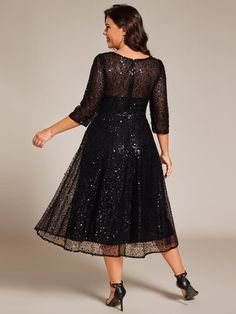 Turn heads in this Plus Size 3/4 Sleeve Midi Round Neck A-Line Sequin Wedding Guest Dress. The A-line silhouette flatters all body types, while the shimmering sequins bring a touch of glamour. With a classic round neck and 3/4 sleeves, this dress offers both style and comfort for special occasions. Perfect for weddings or formal events. Fit: Please refer to size chart. Length: Midi length. Sleeve Style: 3/4 sleeve. Closure: It is concealed a zipper up the back. Undergarments: It is not padded, w Black Wedding Guest Dresses, Midi Wedding Guest Dress, Plus Size Sequin Dresses, Sequin Evening Gowns, Sequin Dresses, Sequin Wedding, Sequin Midi Dress, Glitter Dress, Guest Dress