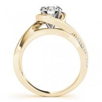 a yellow gold engagement ring with a single diamond in the center and side stones on the band