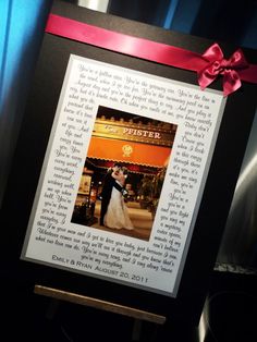 a framed photo with a red ribbon around it and a poem in the middle that reads,