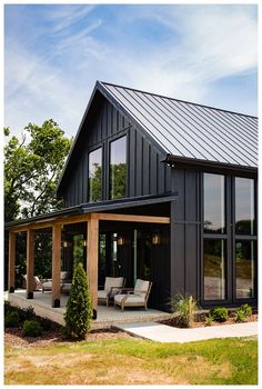 a black house with the words cottage at the ridge on it's front cover