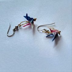 Pair Of Handmade Origami Crane Earrings. The Paper Is Blue, Pink And White With An Ombre Effect. A Gold Thread Loop Attaches Each Bird To A French Hook. Unworn. See My Closet For More Costume Jewelry, Including Some Unique Stuff I Made And I'll Be Adding Supplies Like Beads And Wire For Jewelry Making. I Always Give Deep Discounts On Bundles. Thanks For Looking! 3d5 Paper Crane Origami, Wire For Jewelry Making, Crane Earrings, Origami Earrings, Spike Hoop Earrings, Handmade Jewelry Earrings, Kendra Scott Earrings, Origami Crane, Paper Crane