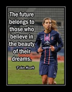 a woman is running in the grass with a quote on her side that says, the future belongs to those who believe in the beauty of their dreams