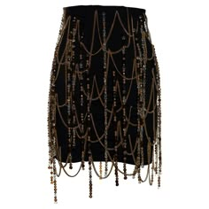 ▪ Dolce & Gabbana black corseted mini skirt ▪ Gold metal chain detail ▪ Beaded tassels ▪ Metal hook closures at centre-back ▪ IT 42 - FR 38 - UK 10 - US 6 ▪ Spring-Summer 1991 Gold Inspired Outfits, Black And Gold Clothes, Dolce And Gabbana Aesthetic, Dolce And Gabbana Skirt, Skirt With Chains, Black And Gold Skirt, Gold Clothes, Gold Corset, Beaded Corset