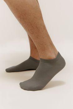 Ultra low profile and super comfortable, these ankle socks are an everyday essential perfect for low-cut footwear. This convenient value pack is great as a practical gift or for restocking your own sock drawer. P.S. They're a great unisex sock option! Details Materials & Care Shipping & Returns • Ankle-length low-cut men's socks in a total of six easy-to-match colors. Each pack includes three pairs of socks in three colors.• Made from a breathable cotton blend with added Spandex for flexibility.