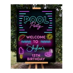 a neon pool party welcome sign on an easel