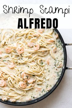 shrimp scampi alfredo in a skillet with text overlay