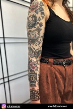 a woman with a tattoo on her arm