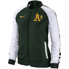 a women's oakland athletics jacket that is green and white