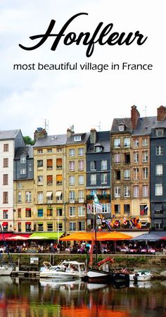 boats are docked in the water next to buildings with words that read hooffleur most beautiful village in france