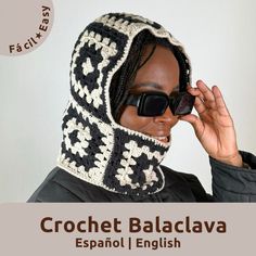 a woman wearing a black and white crochet hood with sunglasses on her face