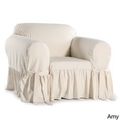 a white chair with ruffles on the arm and back covers in different colors