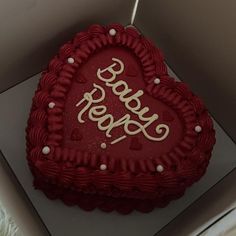 a heart shaped cake with the words happy on it