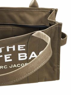 •Top zip fastening•Double top handle•Contrasting namesake branding at front•Interior: one main compartment, one zip pocket, two slip pockets•Back patch with lettering and logo•Textural cotton canvas design•Green color•100% Cotton•Made in Extra EU410x330x150x530mmSize Type: UniqueGender: WomenMaterial: NATURAL (VEG)->COTTON100 %Color: SLATE GREENMade in: VNProduct ID: M0016156-372*Import tax/duty will be calculated at checkout (If applicable) Canvas Double Handle Shoulder Bag With Logo Print, Everyday Top Handle Bags With Logo Print, Cotton Double Handle Bag With Logo Print, Rectangular Canvas Shoulder Bag With Logo Hardware, Canvas Tote Shoulder Bag With Logo Hardware, Everyday Double Handle Bag With Logo Print, Double Handle Canvas Bag With Logo Print, Shopping Bags With Logo Hardware On Canvas, Shopping Canvas Bag With Logo Hardware