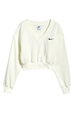 Minimally branded with an embroidered Swoosh, this classic sweatshirt is reimagined with a V-neck and cropped length. 19" length (size Medium) V-neck Ribbed cuffs and hem 80% cotton, 20% polyester Machine wash, tumble dry Imported Nike Sportswear Phoenix Fleece, Cute Nike Outfits, Nike Sweater, Nike Sweatshirts, Tennis Clothes, Nike Outfits, Crop Sweatshirt, White Nikes, Nike Sportswear