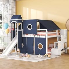 a child's bedroom with a play house and slide