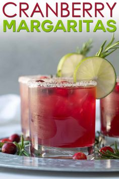 cranberry margaritas with lime and rosemary garnish