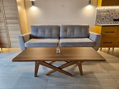 a couch and coffee table in a room