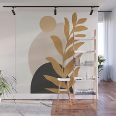 a living room wall mural with an orange plant in the center and a white chair next to it