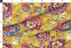 a yellow background with colorful flowers and leaves on it, as well as measurements for the fabric