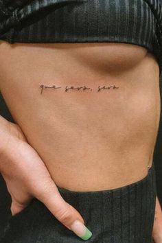 a woman's stomach with the words you are so strong written on her side