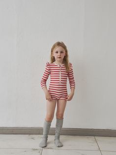 This premium children's swimwear set features a ribbed stripe design with a half-zip front closure, made from a polyester-polyurethane blend with UPF 50+ protection. The set includes thoughtful details like YKK zippers with fabric plackets, three-quarter length bottoms with soft lining, and uses high-quality DTP printing for a luxurious finish. The Korean-made swimsuit is available in sizes S-L for children aged 2-5 years, with moisture-wicking properties and four-way stretch for comfort during Swimwear Sets, Kids Swimwear, Swimsuit Set, Three Quarter, Half Zip, Stripes Design, Zip Ups, Active Wear, Zipper