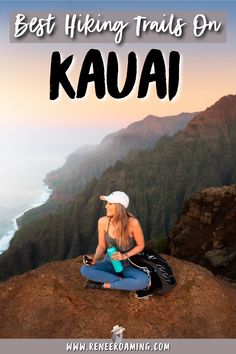 a woman sitting on top of a mountain with the words best hiking trails on kaua