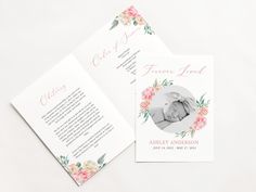 two folded cards with pink and white flowers on them, one has an image of a baby