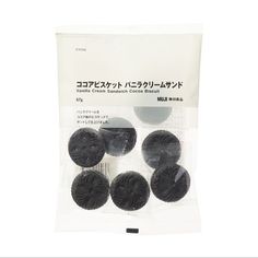 four cookies are packaged in a package with japanese writing on the front and back side