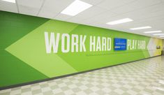 an empty hallway with the words work hard painted on it