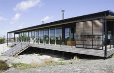 a house that is sitting on top of a hill