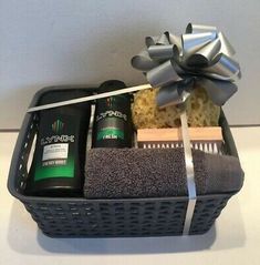 a basket filled with men's grooming items and a bow on the top