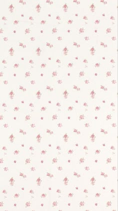 a white and pink wallpaper with small floral designs on it's side,