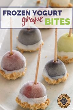 frozen yogurt grape bites on a white plate with text overlay that reads frozen yogurt grape bites