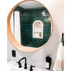 a bathroom sink with a mirror above it