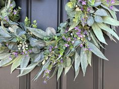 Step into a tranquil garden with our Eucalyptus and Bay Leaf Cottage Door Wreath. A delicate mix of soft lifelike lavender sprigs and lush eucalyptus leaves brings the beauty of nature to your door, evoking the feeling of a peaceful spring morning. Perfect for adding a calming touch to any space, this handcrafted wreath offers a serene escape into fresh air, blue skies, and sun-kissed days. Ideal for both indoor and covered outdoor use. Lavender Sprigs, Tranquil Garden, Fruit Wreath, Wreath Hangers, Cottage Door, Wreath Accessories, Spring Morning, Swag Wreath, Tulip Wreath